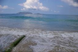 Looking out towards small islands from Cane Garden Bay beach in Tortola.jpg
