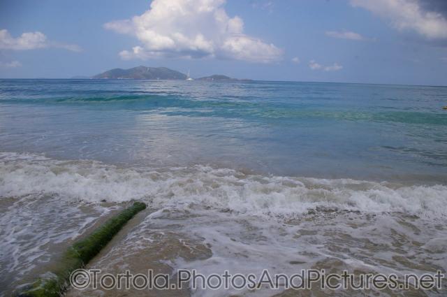 Looking out towards small islands from Cane Garden Bay beach in Tortola.jpg
