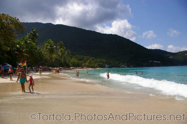 Wave hits the beach at Cane Garden Bay in Tortola.jpg
