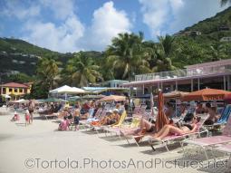 People on beach chairs at Cane Garden Bay in Tortola.jpg