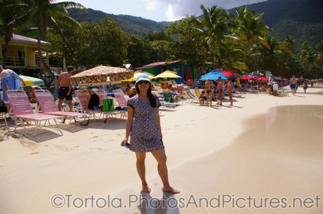 Joann stands in the sand of beach of Cane Garden Bay in Tortola.jpg
