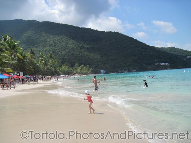Beach goers at Cane Garden Bay in Tortola.jpg