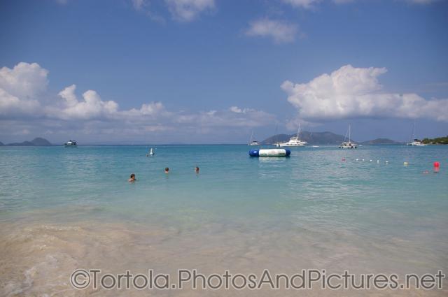 Clear waters and boats of Cane Garden Bay in Tortola.jpg