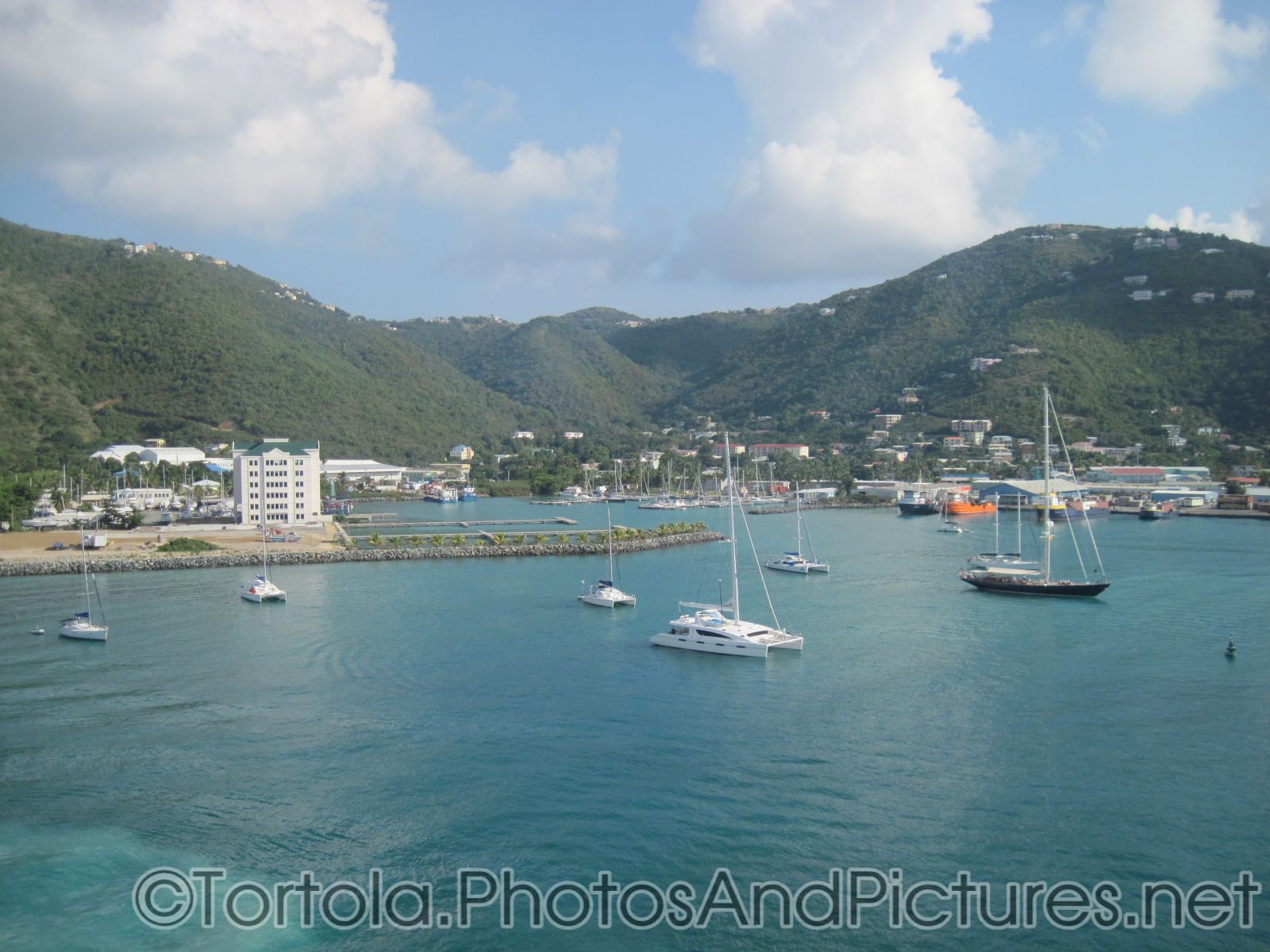 Hotel and sail boats at Tortola cruise port as viewed from catamaran.jpg
