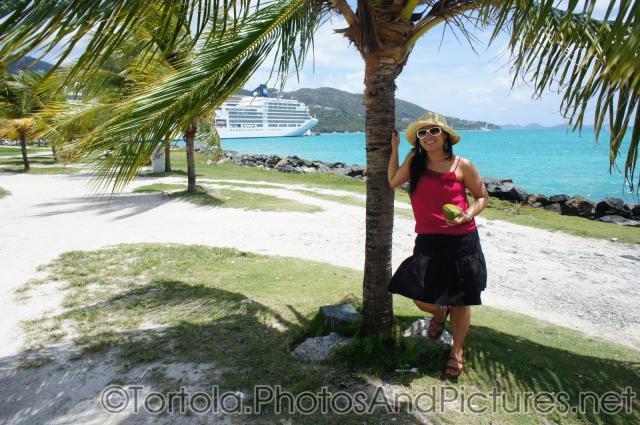 Joann holds a coconut in Tortola.jpg