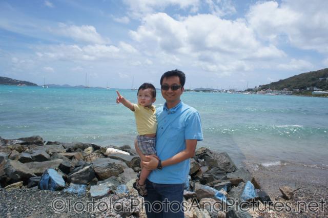 Darwin points at a flag as daddy holds him in Tortola.jpg
