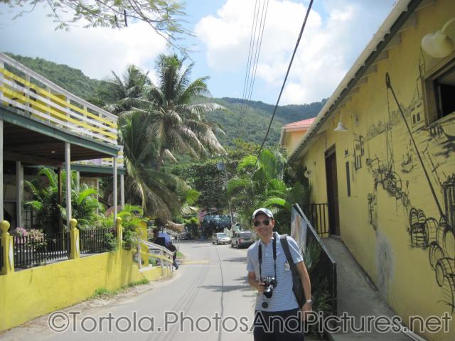 David stands at a street at Cane Garden Bay in Tortola.jpg

