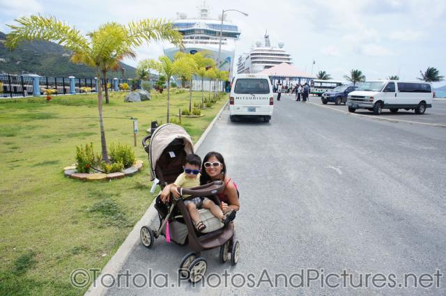 Darwin in a stroller next to Mommy in front of cruise ships in Tortola.jpg
