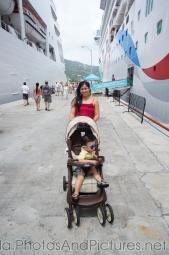Darwin in a stroller pushed by Mommy at Tortola docks between NCL Dawn and Silversea Silver Spirit.jpg
