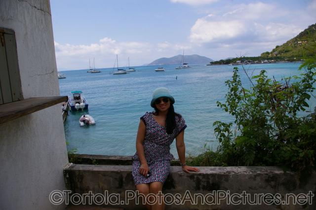 Joann sits in front of Cane Garden Bay in Tortola.jpg
